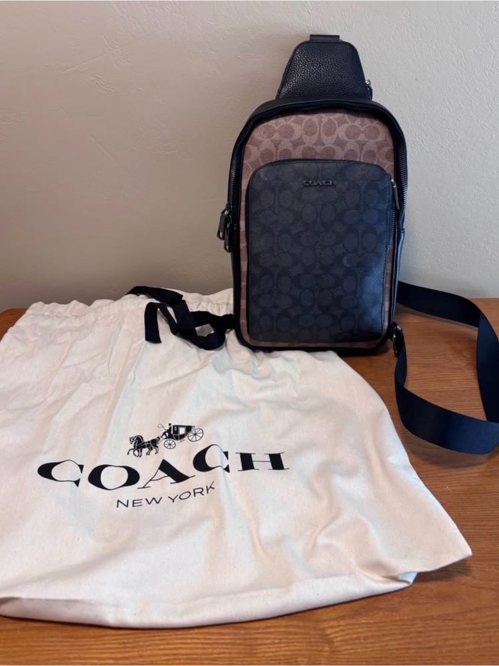 Coach Men's Signature Canvas Sling Bag in Black and Brown